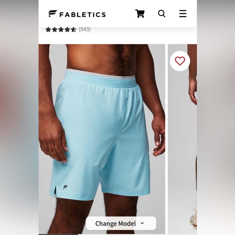 Fabletics men’s Medium Fundamental shorts Unlined, light blue athleisure